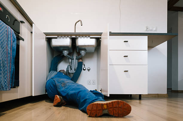 Professional Drain Cleaning technician working in Carrollton, TX